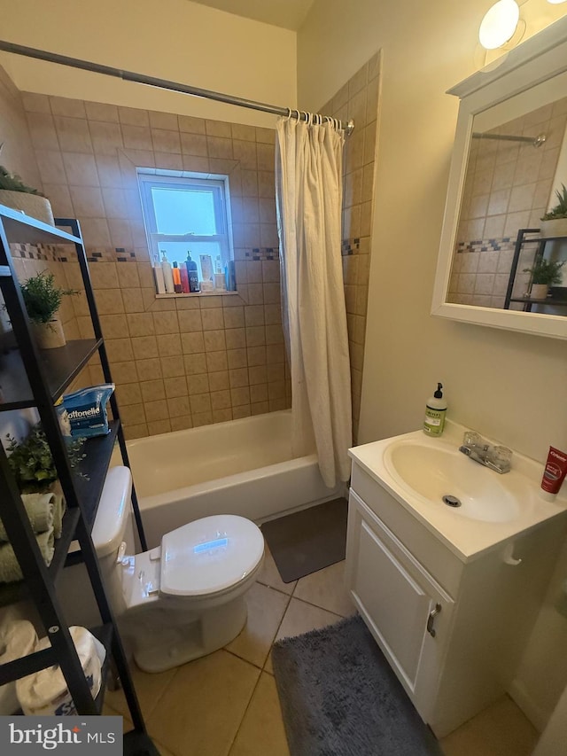 full bathroom with tile patterned flooring, toilet, shower / bathtub combination with curtain, and vanity