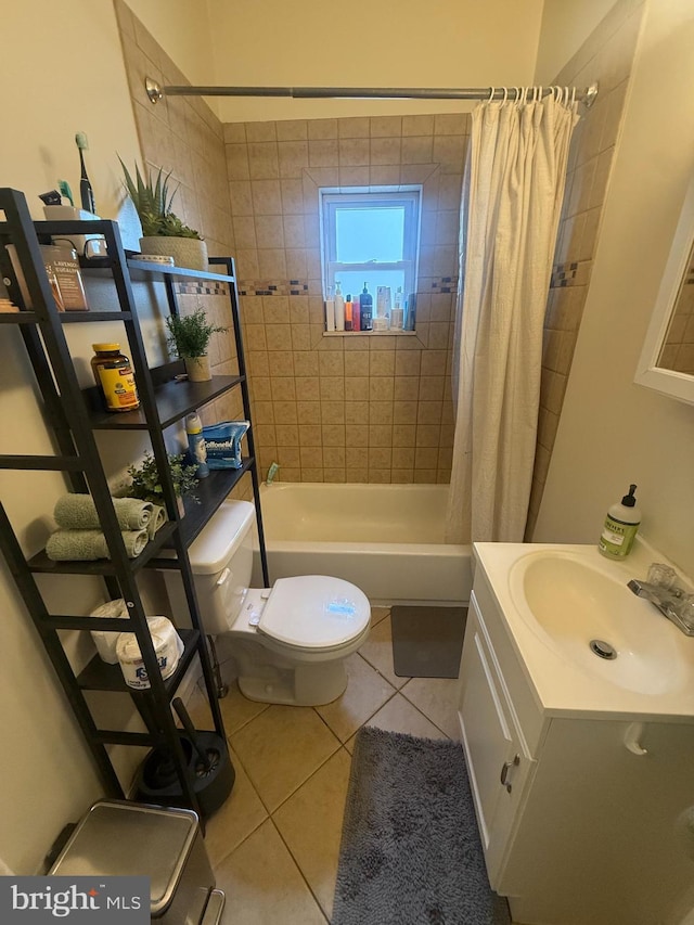 full bathroom with tile patterned flooring, toilet, shower / bath combination with curtain, and vanity