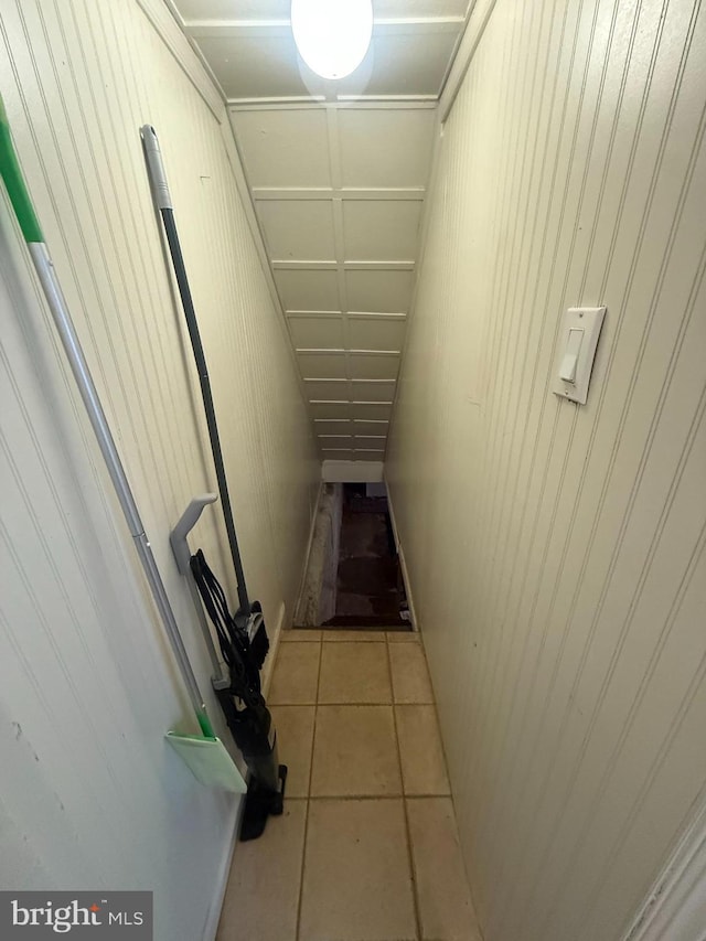 corridor with tile patterned flooring