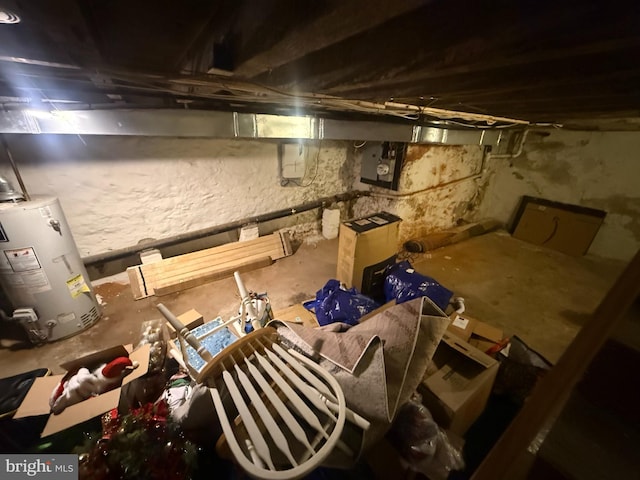 unfinished below grade area featuring water heater
