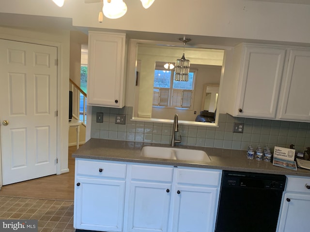 1170 Hisey Ave, Woodstock, VA 22664 - kitchen with dishwasher, a sink, a chandelier, white cabinets, and backsplash