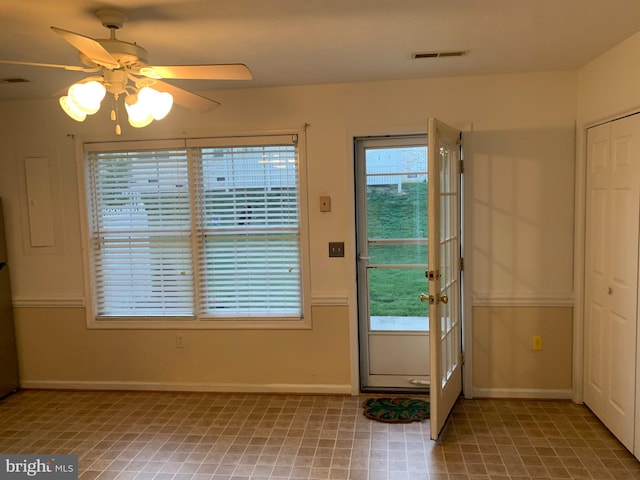 1170 Hisey Ave, Woodstock, VA 22664 - entrance foyer featuring ceiling fan, baseboards, plenty of natural light, and french doors