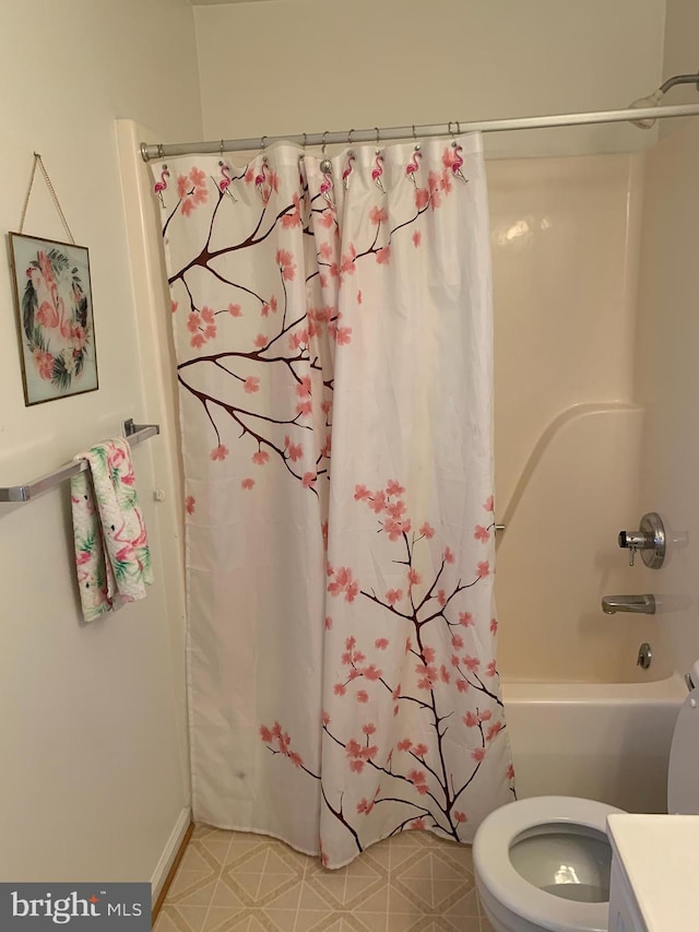 1170 Hisey Ave, Woodstock, VA 22664 - bathroom with toilet, vanity, and shower / tub combo with curtain