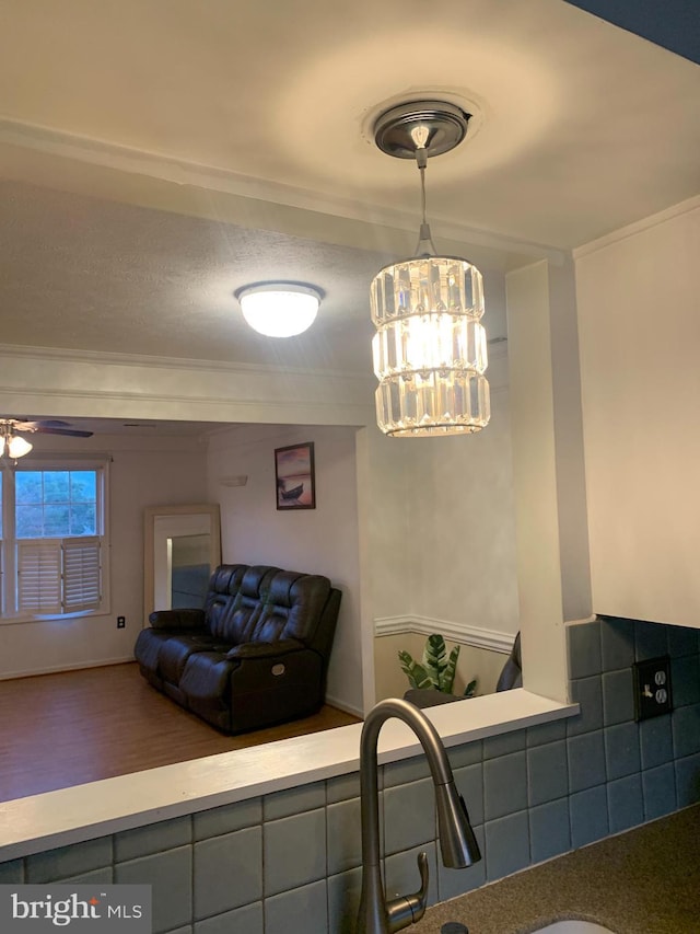 1170 Hisey Ave, Woodstock, VA 22664 - dining area with ornamental molding, a ceiling fan, and a chandelier