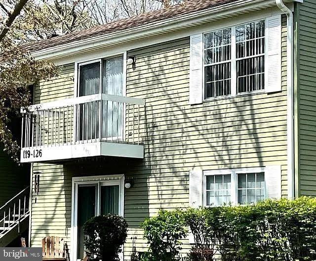 126 Club Pl Unit 126, Absecon, NJ 08205 - view of side of property featuring a balcony