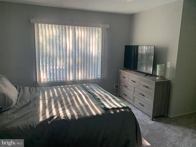 126 Club Pl Unit 126, Absecon, NJ 08205 - bedroom with light colored carpet