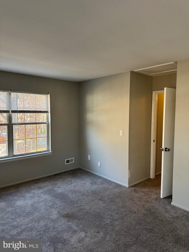 126 Club Pl Unit 126, Absecon, NJ 08205 - carpeted empty room featuring attic access and baseboards