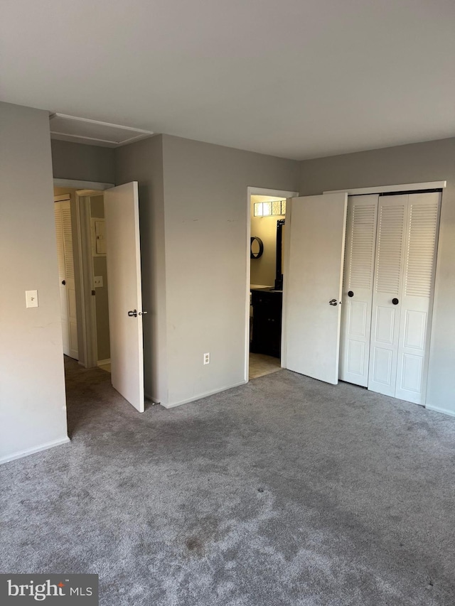 126 Club Pl Unit 126, Absecon, NJ 08205 - unfurnished bedroom with carpet floors, baseboards, attic access, and ensuite bath