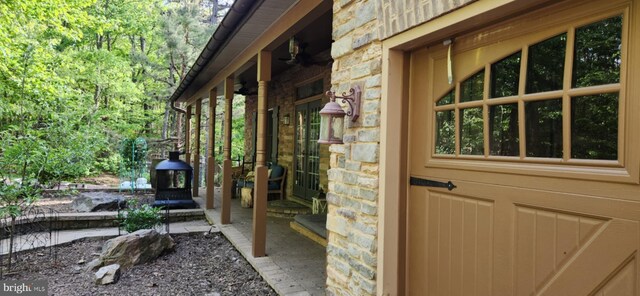 227 Haines Dr, Capon Bridge, WV 26711 - view of exterior entry featuring stone siding