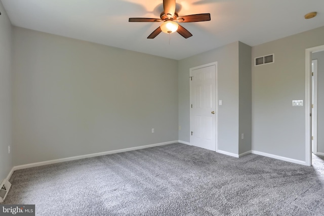 unfurnished bedroom featuring carpet, baseboards, and a ceiling fan