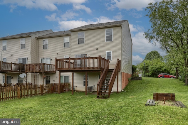 back of house featuring cooling unit, stairs, and a wooden deck