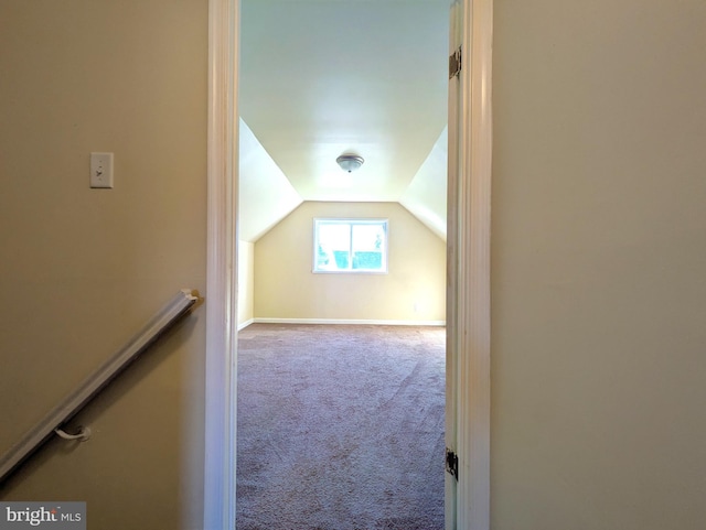 bonus room with carpet, lofted ceiling, and baseboards