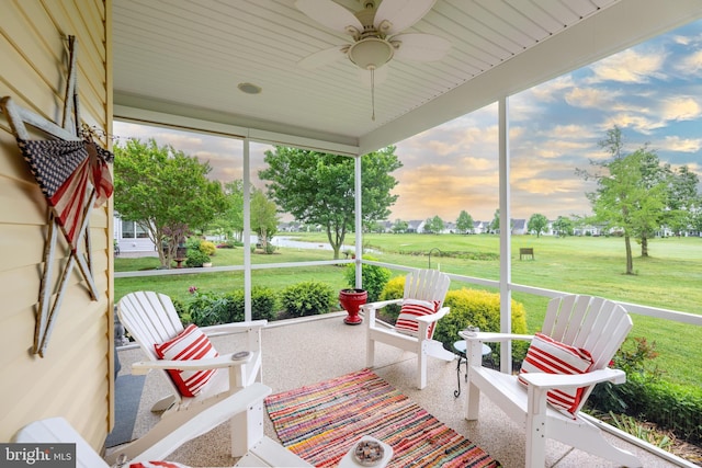 sunroom / solarium with ceiling fan