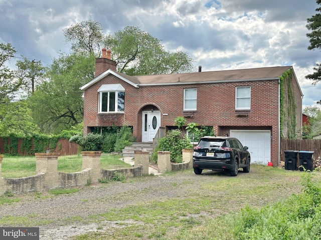 2315 Ilene Ln, Atco, NJ 08004 - raised ranch with driveway, an attached garage, fence, brick siding, and a chimney
