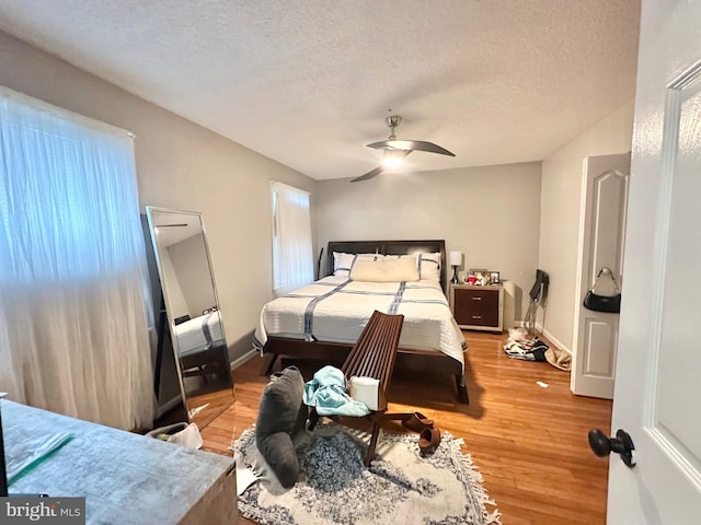 2315 Ilene Ln, Atco, NJ 08004 - bedroom with a textured ceiling, a ceiling fan, light wood-style flooring, and baseboards