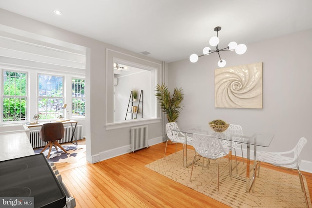 2420 2nd St NE, Washington, DC 20002 - dining space featuring radiator, a chandelier, wood finished floors, and recessed lighting