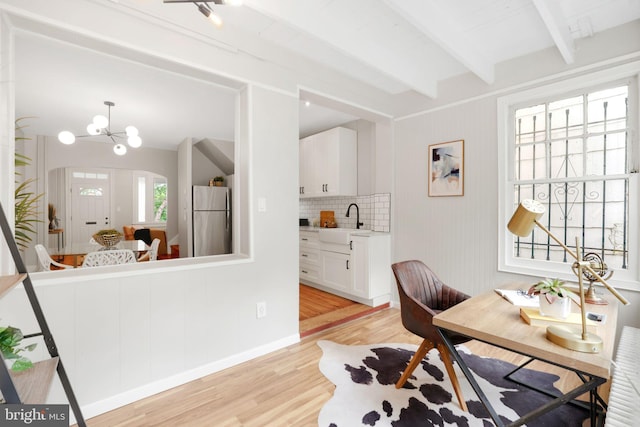 2420 2nd St NE, Washington, DC 20002 - office featuring light wood-style flooring, a sink, and beamed ceiling