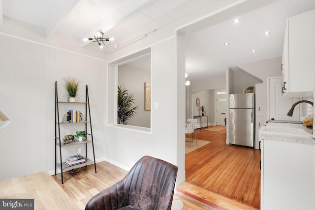 2420 2nd St NE, Washington, DC 20002 - living area featuring light wood-style floors and a chandelier