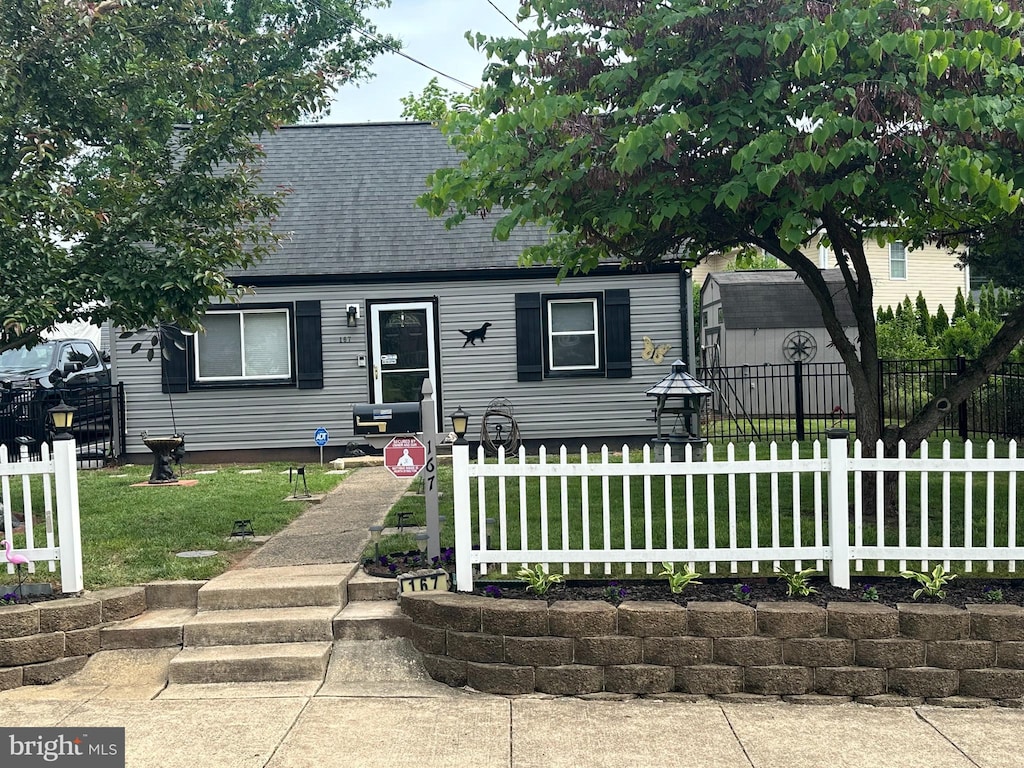cape cod-style house with a shingled roof