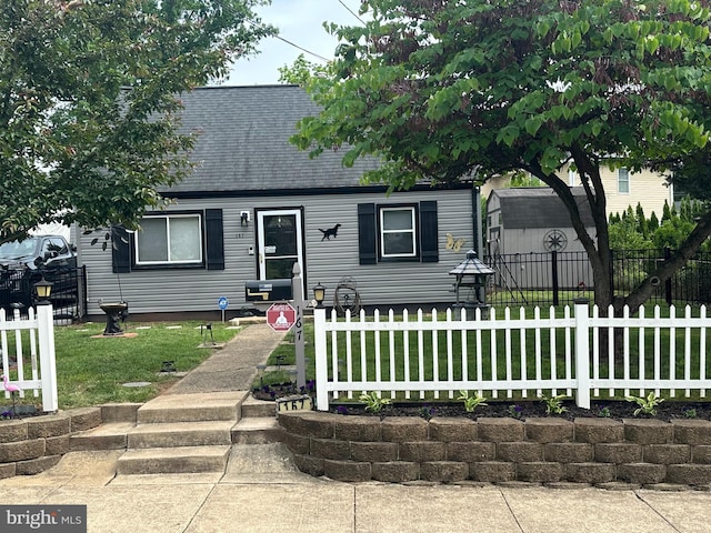 cape cod-style house with a shingled roof