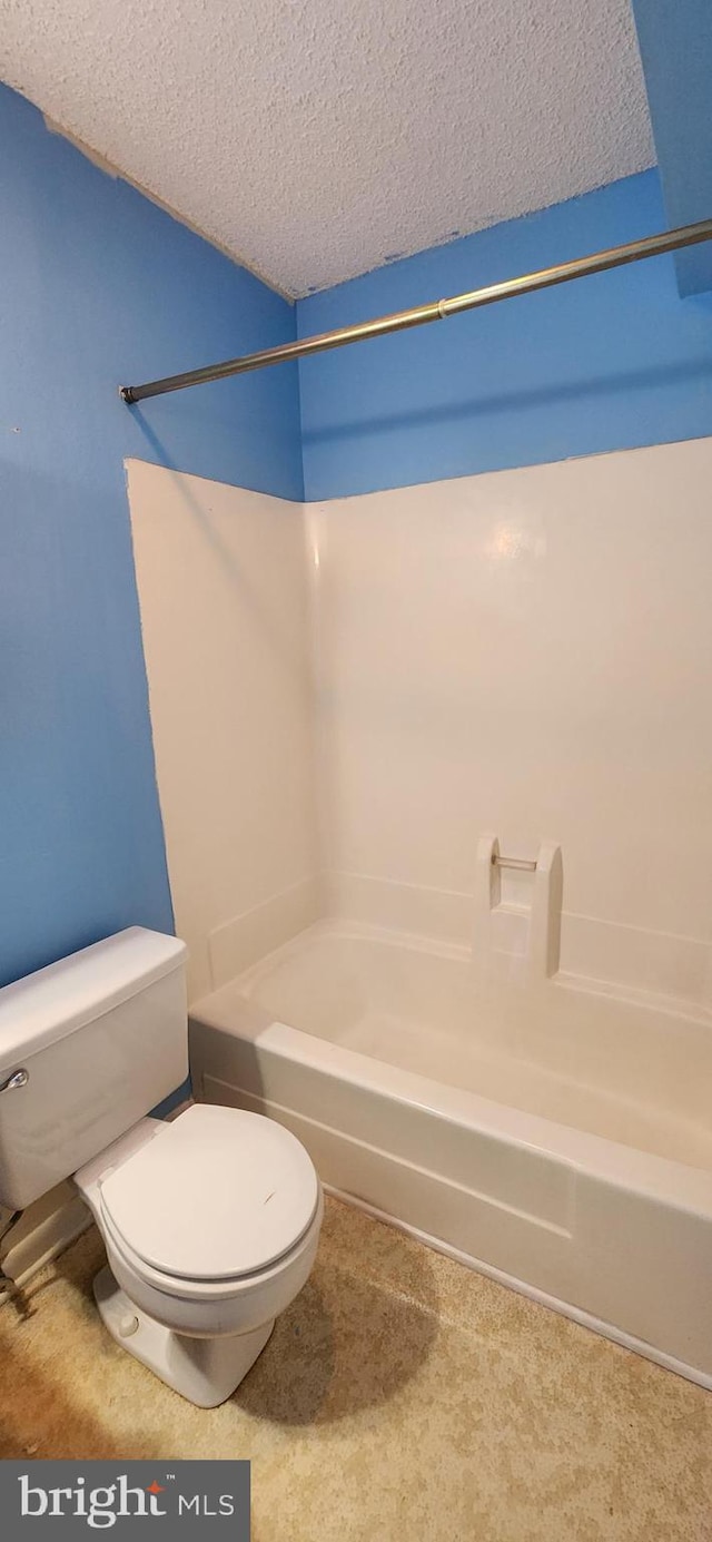 149 Captains Quarters Rd Unit 20102, Ocean City, MD 21842 - bathroom with toilet, tub / shower combination, and a textured ceiling