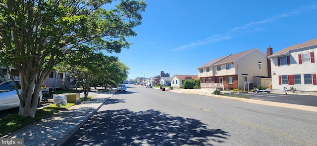 149 Captains Quarters Rd Unit 20102, Ocean City, MD 21842 - view of asphalt street featuring a residential view, sidewalks, and curbs