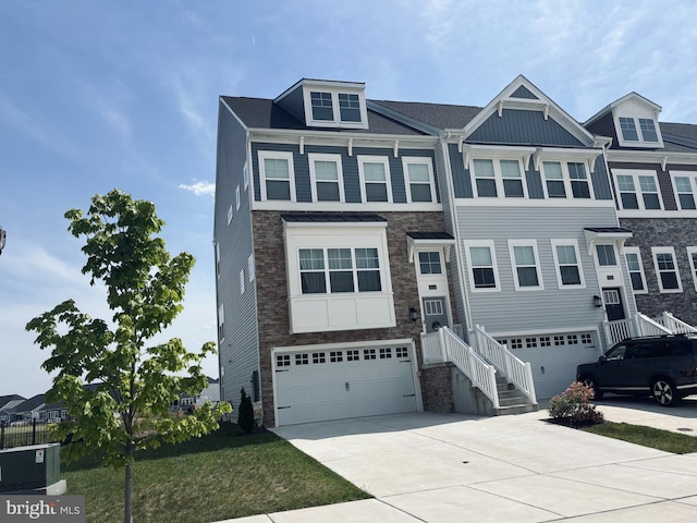 35342 Wright Way, Millsboro, DE 19966 - view of front of house with a garage, driveway, stone siding, and board and batten siding
