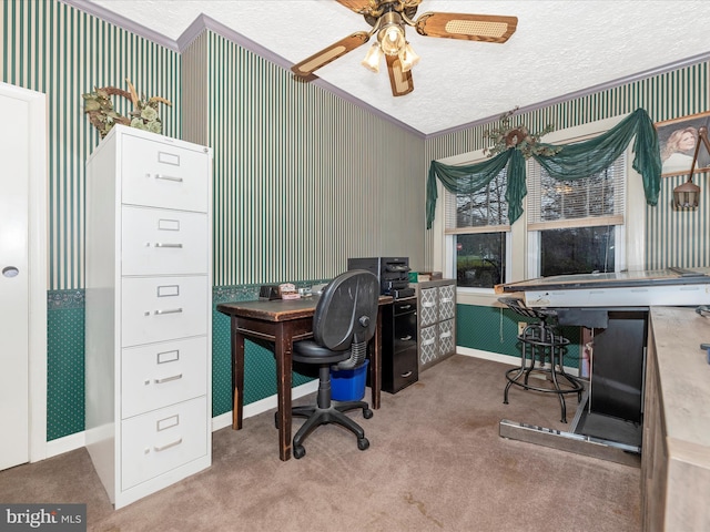 office space with carpet, wallpapered walls, ceiling fan, a textured ceiling, and baseboards