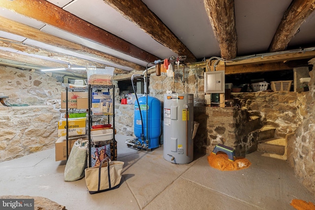 unfinished basement with water heater, a water pressure tank, and electric panel