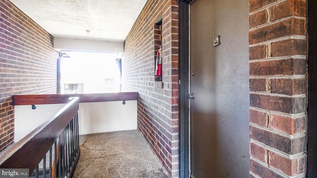 doorway to property featuring a balcony