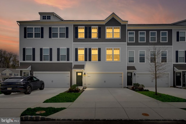 16 Foundry Blvd, Mount Holly, NJ 08060 - townhome / multi-family property with concrete driveway and an attached garage
