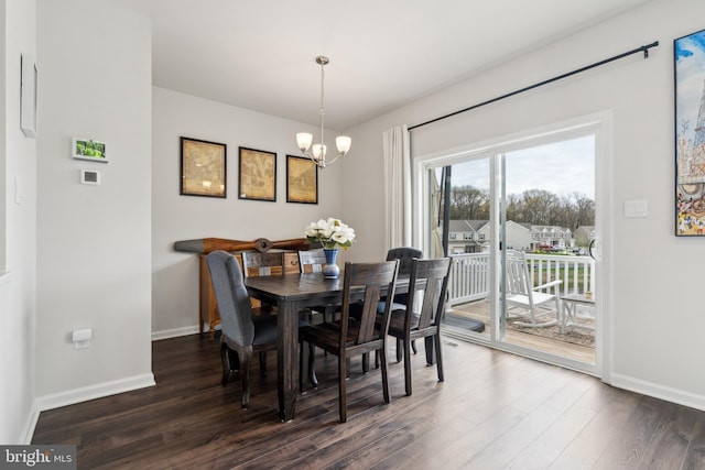 16 Foundry Blvd, Mount Holly, NJ 08060 - dining area with a chandelier, dark wood-style floors, and baseboards