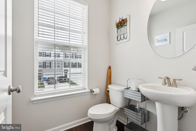 16 Foundry Blvd, Mount Holly, NJ 08060 - bathroom featuring baseboards, plenty of natural light, toilet, and wood finished floors