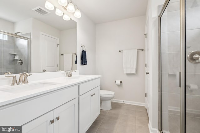 16 Foundry Blvd, Mount Holly, NJ 08060 - bathroom featuring a stall shower, tile patterned floors, toilet, double vanity, and baseboards