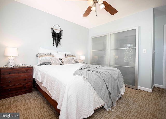 3211 Leverton Ave, Baltimore, MD 21224 - bedroom with carpet, a ceiling fan, and baseboards