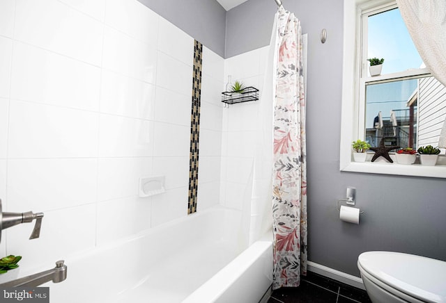 3211 Leverton Ave, Baltimore, MD 21224 - bathroom featuring baseboards, toilet, and shower / bath combo with shower curtain