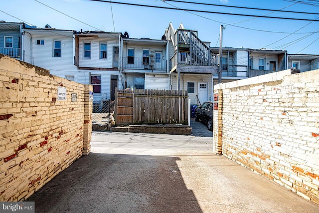 3211 Leverton Ave, Baltimore, MD 21224 - view of front of house featuring fence and a residential view