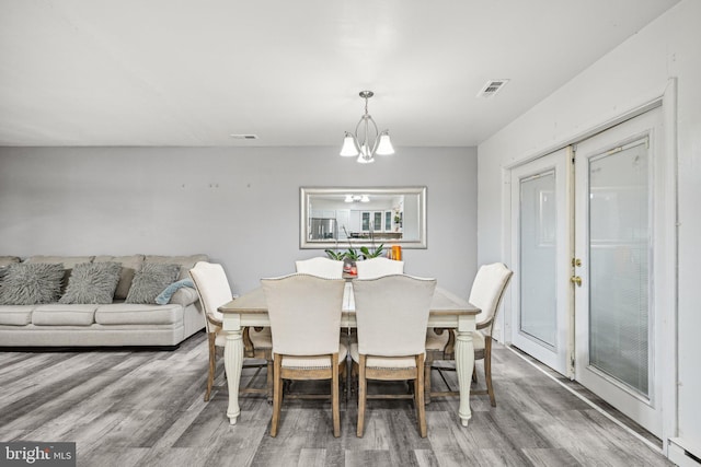 184 Chatham St, Pemberton, NJ 08015 - dining room with wood finished floors and a chandelier
