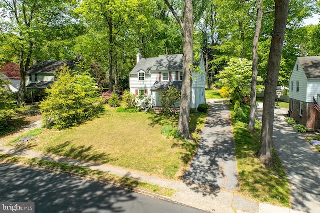 view of front of house with a chimney