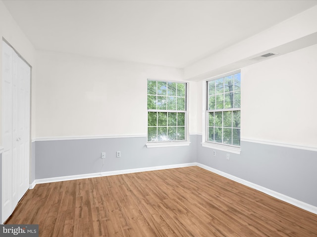 206 Water Fountain Ct Unit 201, Glen Burnie, MD 21060 - unfurnished room featuring wood finished floors and baseboards