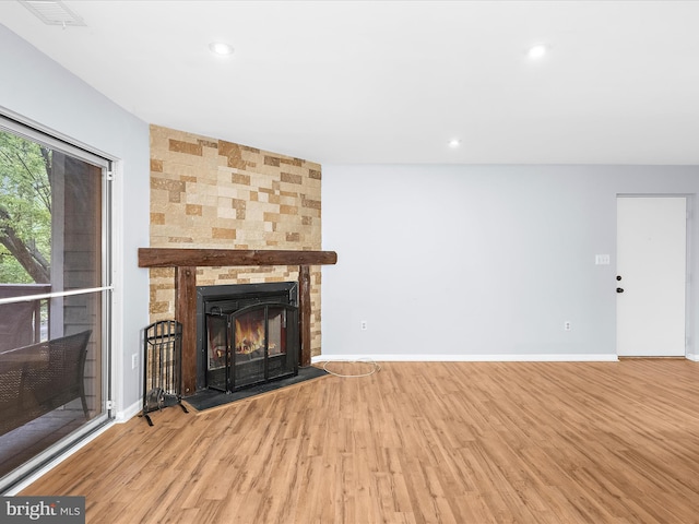 206 Water Fountain Ct Unit 201, Glen Burnie, MD 21060 - unfurnished living room with wood finished floors, a large fireplace, baseboards, and recessed lighting