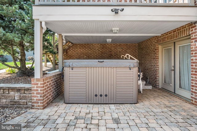 view of patio / terrace featuring a hot tub