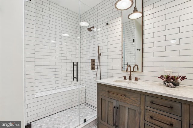 1314 Wallach Pl NW, Washington, DC 20009 - bathroom featuring vanity, a stall shower, and tasteful backsplash