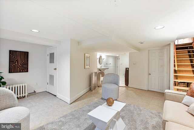 1314 Wallach Pl NW, Washington, DC 20009 - living room featuring radiator, tile patterned floors, stairs, baseboards, and recessed lighting