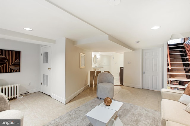 1314 Wallach Pl NW, Washington, DC 20009 - living area featuring radiator, light tile patterned floors, baseboards, and recessed lighting