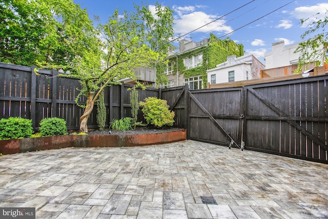 1314 Wallach Pl NW, Washington, DC 20009 - view of patio featuring a gate and a residential view