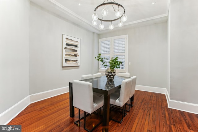 1314 Wallach Pl NW, Washington, DC 20009 - dining space featuring a chandelier, baseboards, wood finished floors, and ornamental molding