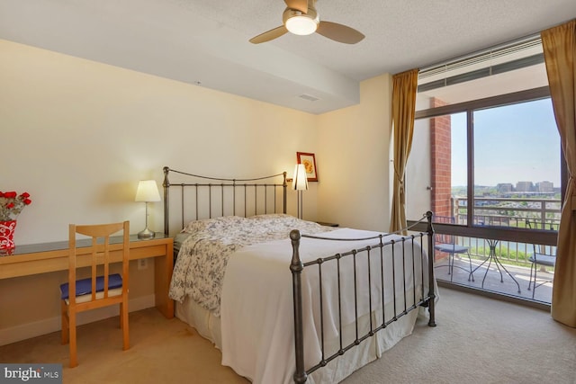 3600 S Glebe Rd Unit 822W, Arlington, VA 22202 - carpeted bedroom featuring access to exterior, a textured ceiling, and baseboards