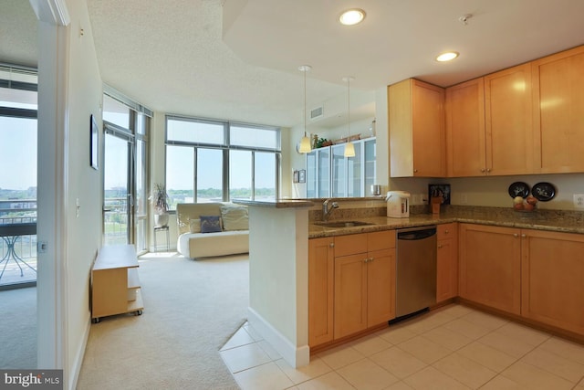 3600 S Glebe Rd Unit 822W, Arlington, VA 22202 - kitchen with dishwasher, a sink, floor to ceiling windows, a peninsula, and stone counters