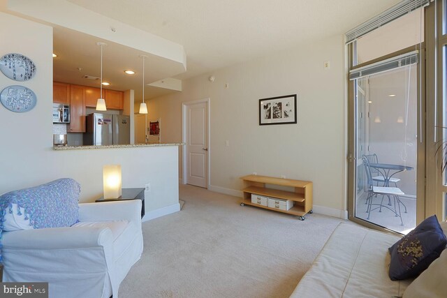 3600 S Glebe Rd Unit 822W, Arlington, VA 22202 - living area with light colored carpet, baseboards, and recessed lighting